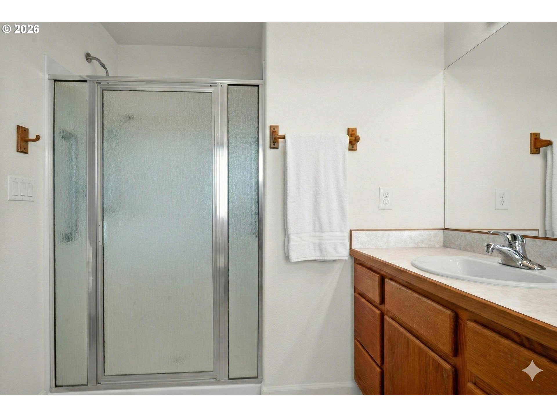 85675 Glenada Road Florence, OR 97439 - Photo 23 of 42 a bathroom with a granite countertop sink shower and a mirror