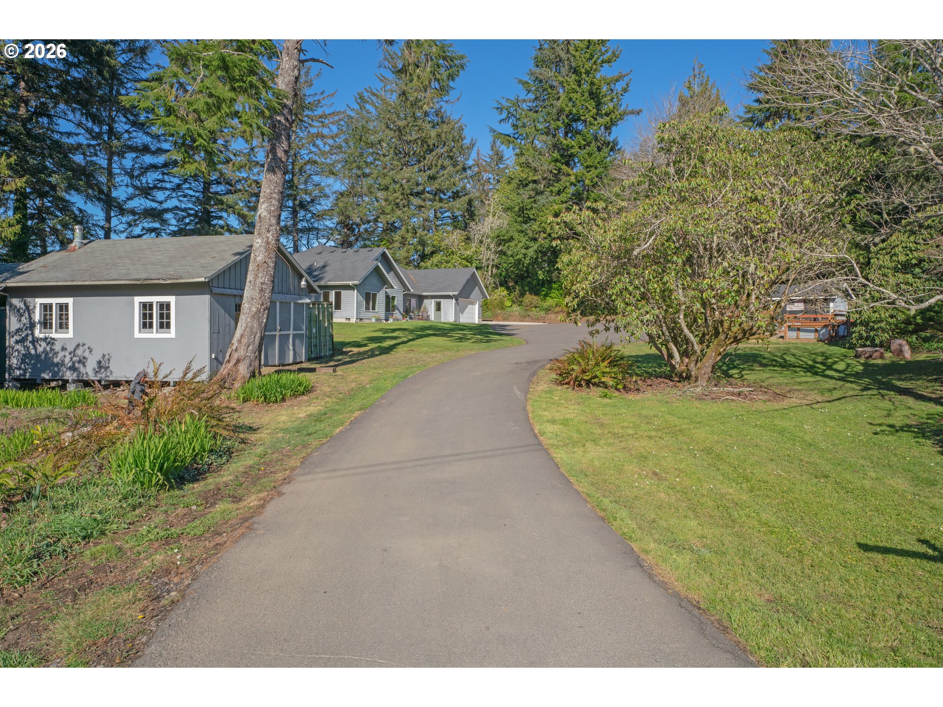 85675 Glenada Road Florence, OR 97439 - Photo 35 of 42 a view of a house with a backyard