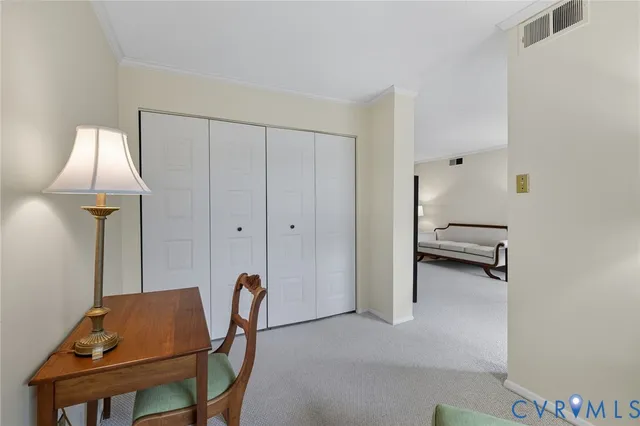 a workspace with furniture and a window