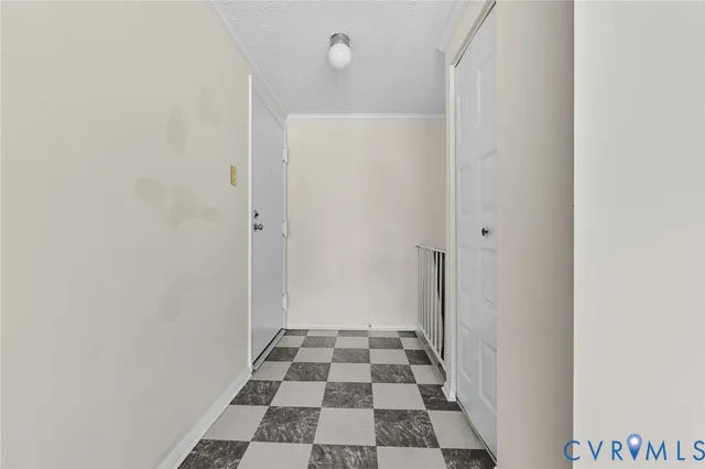 a view of a bathroom with white and a shower