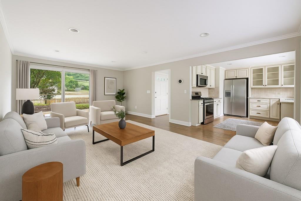 3838 Longview Drive Chamblee, GA 30341 - Photo 3 of 45 a living room with furniture and a large window