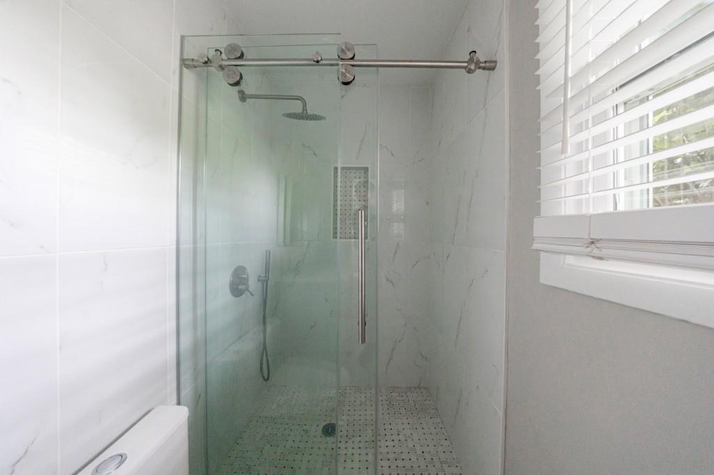 3838 Longview Drive Chamblee, GA 30341 - Photo 31 of 45 a bathroom with a shower