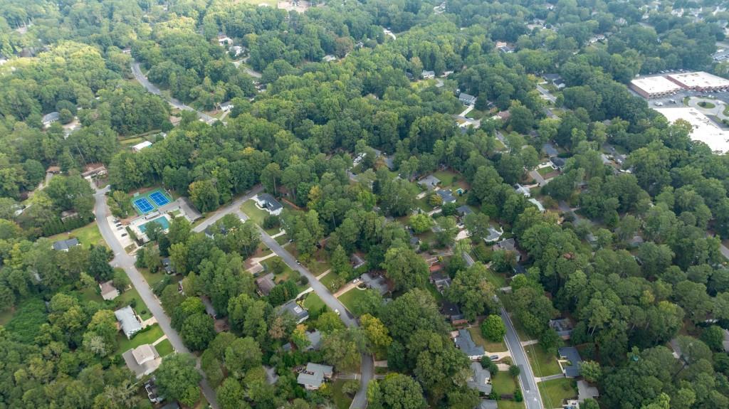 3838 Longview Drive Chamblee, GA 30341 - Photo 43 of 45 an aerial view of residential houses with outdoor space and trees
