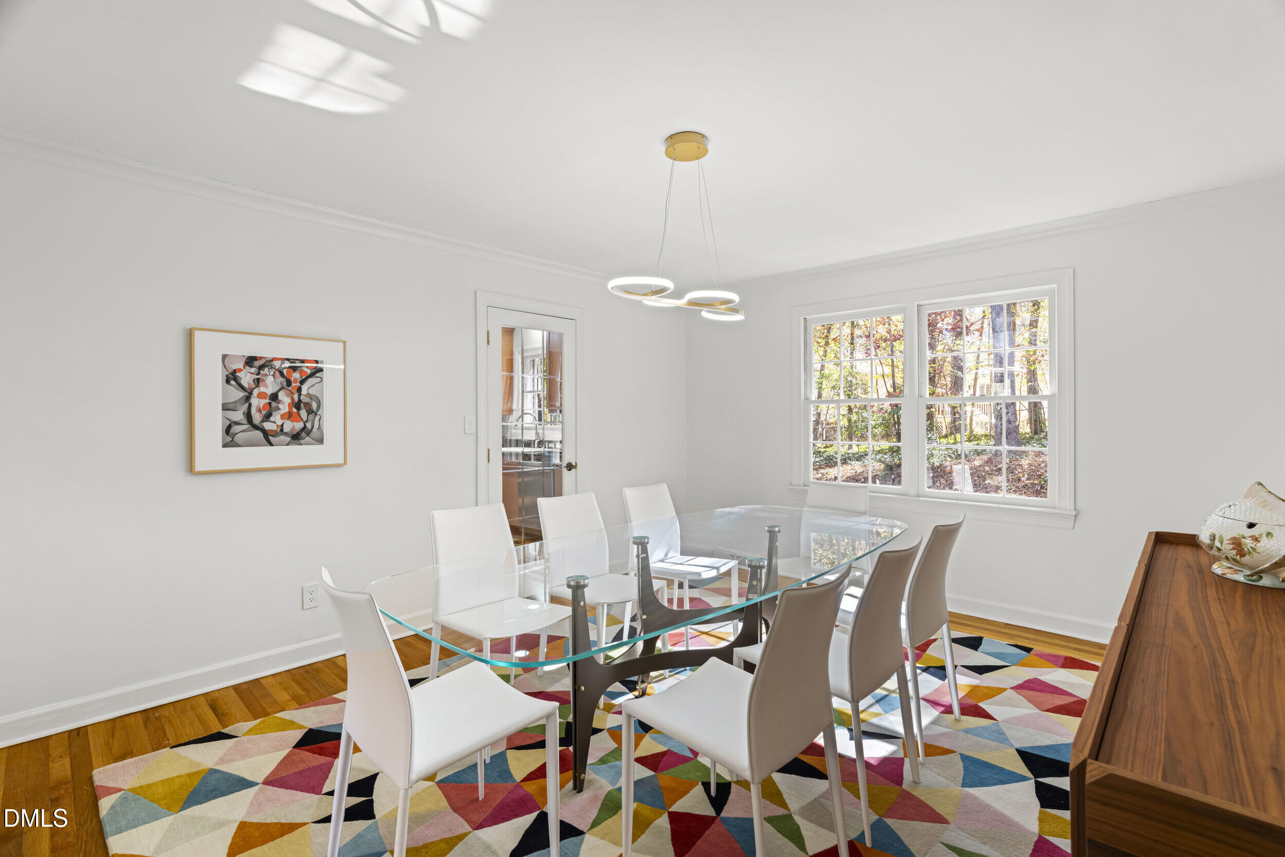2105 Yorkgate Drive Raleigh, NC 27612 - Photo 14 of 42 a very nice looking dining room with a table and chairs