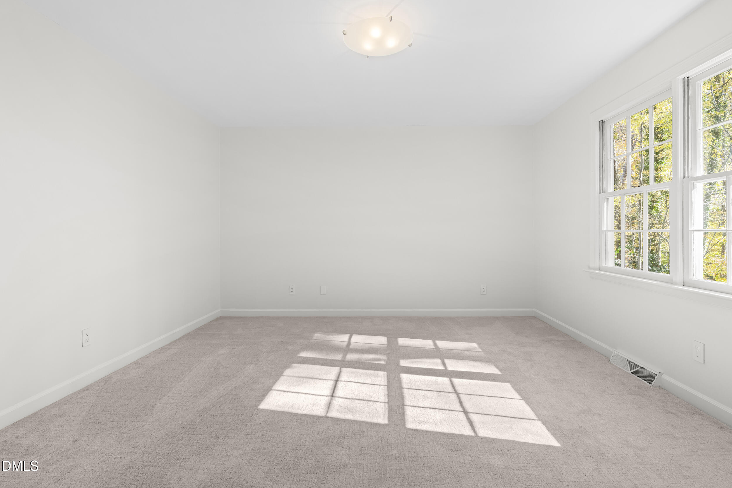 2105 Yorkgate Drive Raleigh, NC 27612 - Photo 23 of 42 an empty room with a window