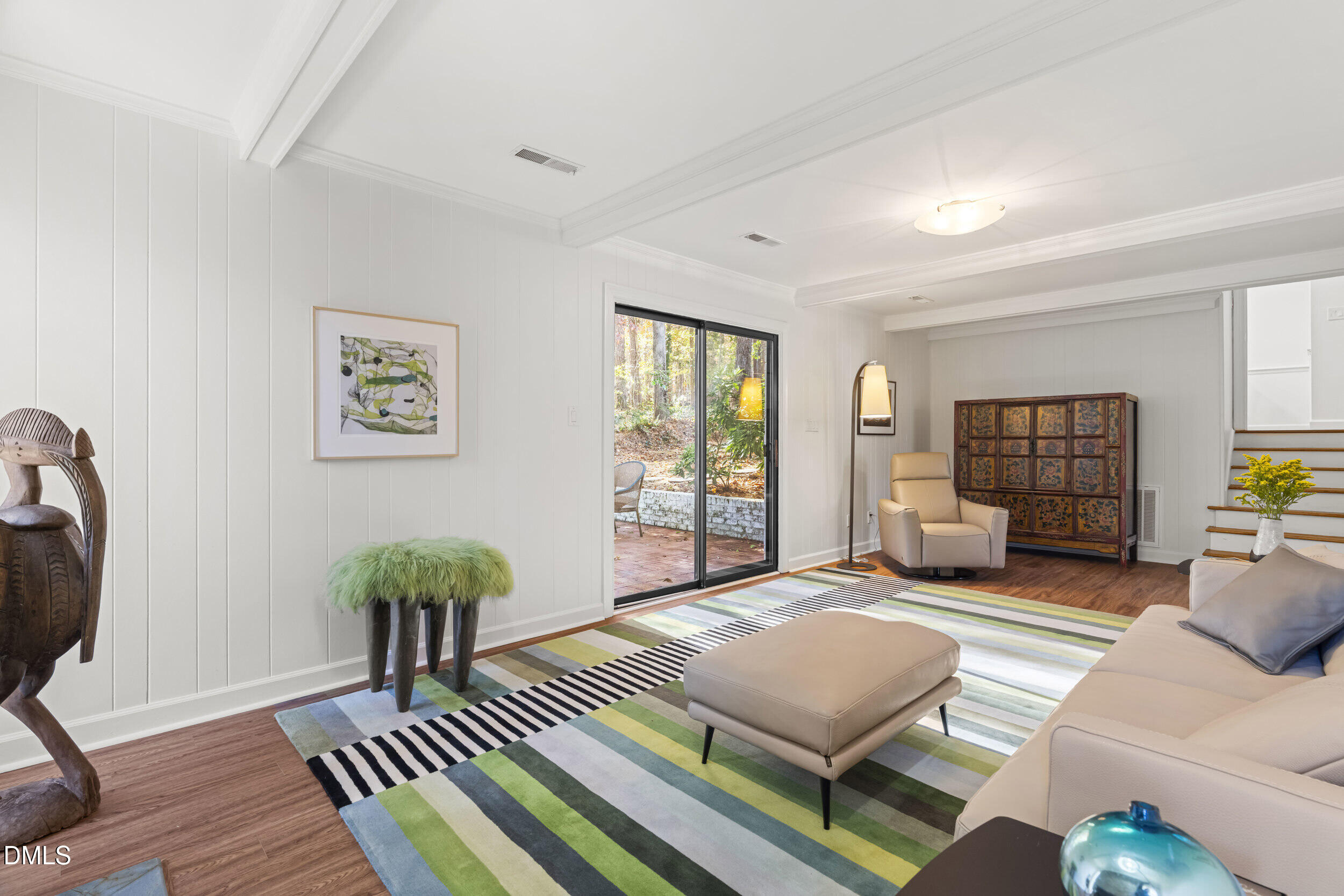 2105 Yorkgate Drive Raleigh, NC 27612 - Photo 27 of 42 a living room with furniture and a window