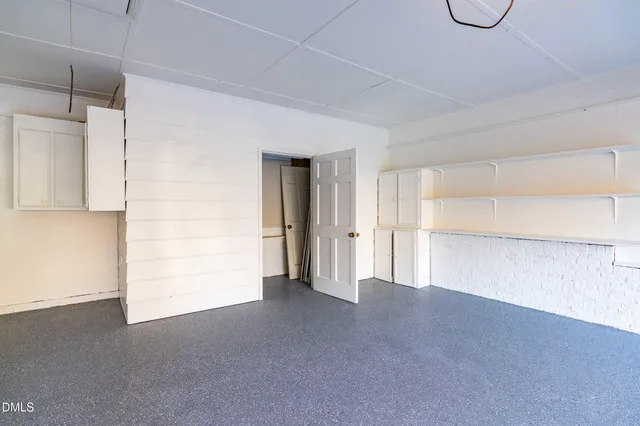 a view of a water heater and a kitchen