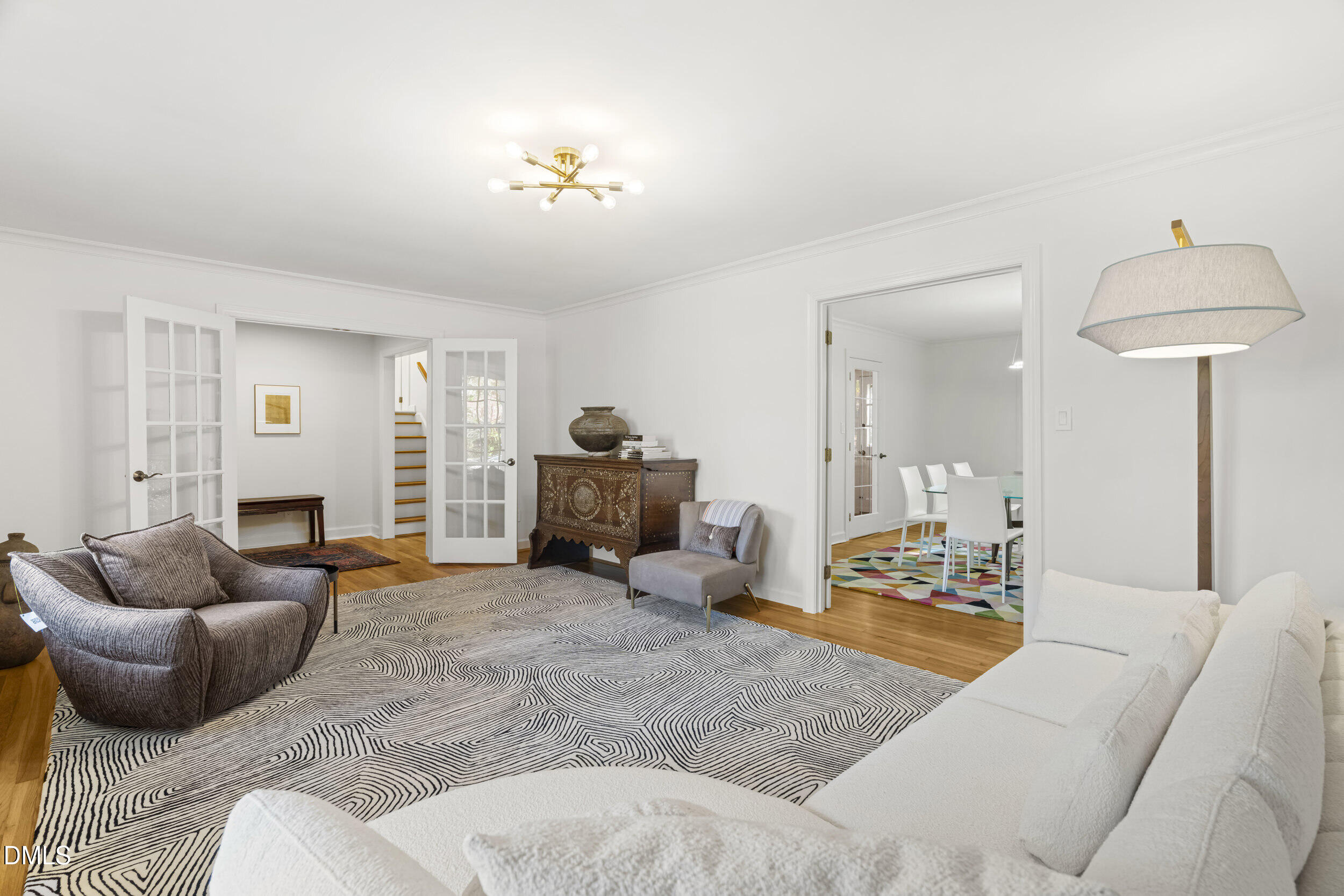 2105 Yorkgate Drive Raleigh, NC 27612 - Photo 6 of 42 a living room with furniture and a lamp