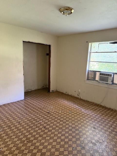 9800 North County Road Frisco, TX 75033 - Photo 9 of 14 Unfurnished bedroom with a closet and cooling unit