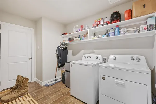 a utility room with dryer and washer