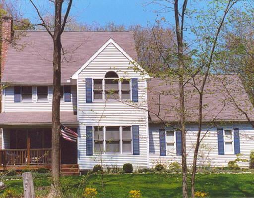 72 North Mountain Road Brookfield, CT 06804 - Photo 1 of 1 a front view of a house with a yard