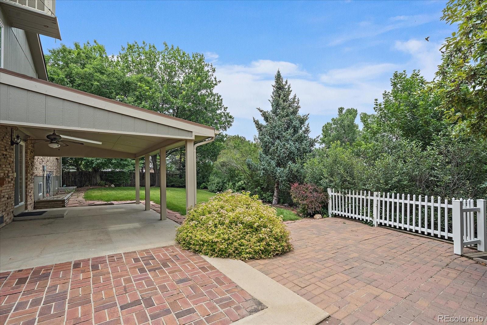 10961 Gray Circle Westminster, CO 80020 - Photo 21 of 24 a view of a garden with pathway