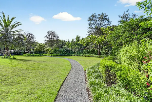 a view of a golf course with a garden