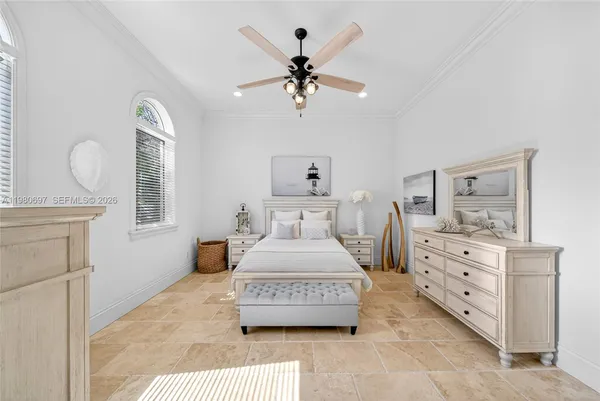 a bathroom with a double vanity sink toilet and shower
