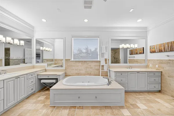 a kitchen with a sink and a stove top oven