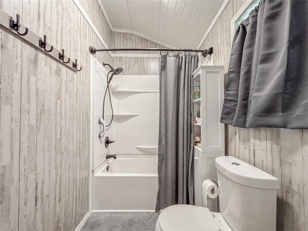 386 North Rock Creek Road Waco, TX 76708 - Photo 20 of 40 a bathroom with a toilet and a shower