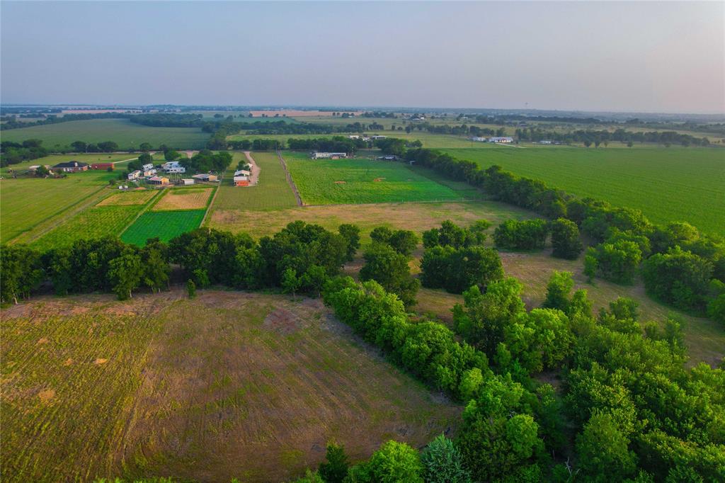 386 North Rock Creek Road Waco, TX 76708 - Photo 32 of 40 an aerial view of a residential houses with outdoor space and river
