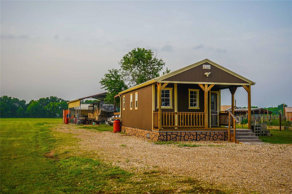 386 North Rock Creek Road Waco, TX 76708 - Photo 8 of 40 a front view of a house with a yard