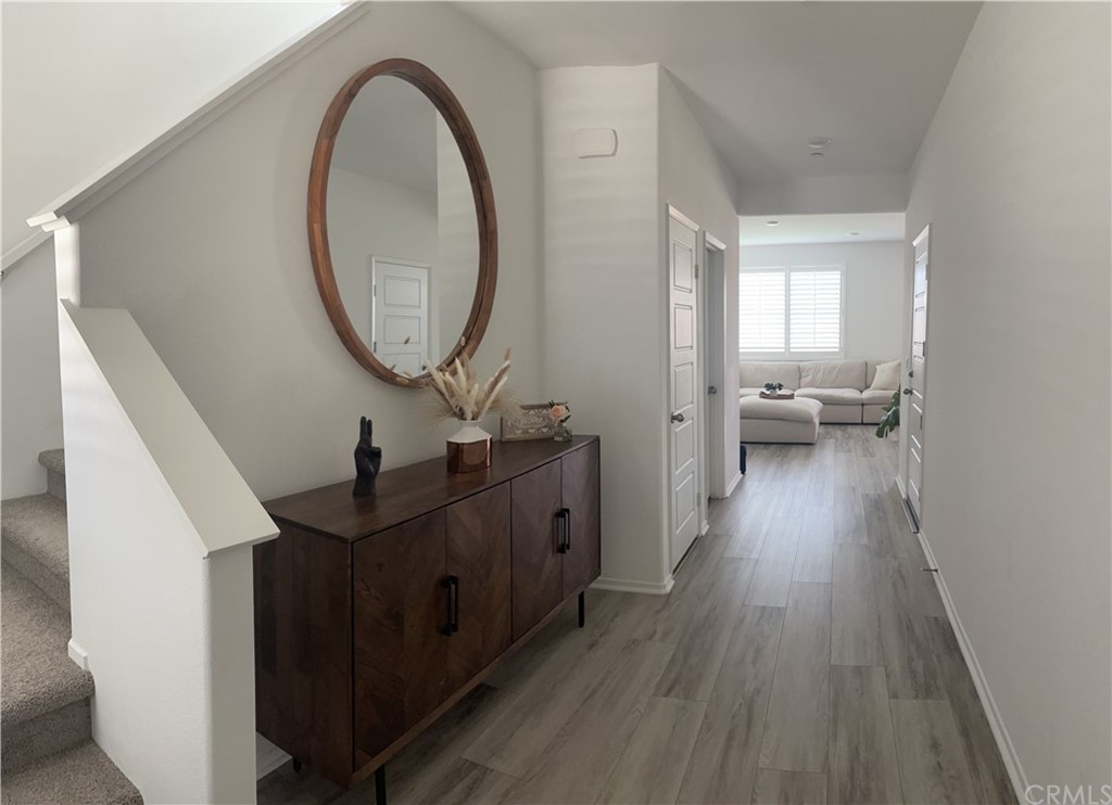 5895 Nectar Drive Banning, CA 92220 - Photo 2 of 29 a spacious bathroom with a double vanity sink and a mirror
