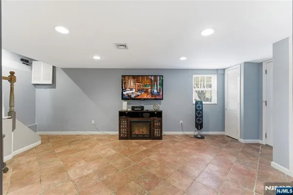 a view of a livingroom with a flat screen tv