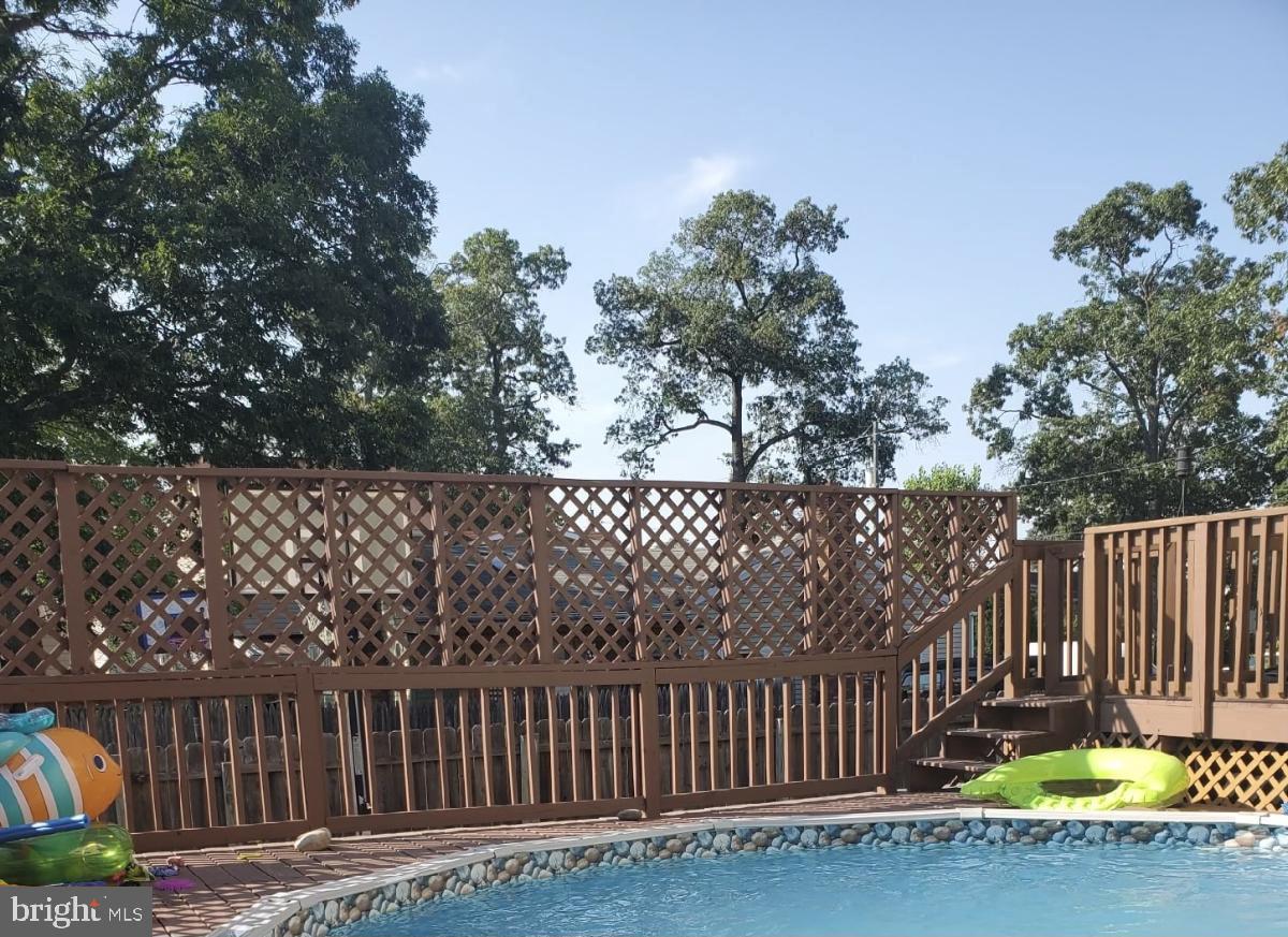 7836 East Shore Road Pasadena, MD 21122 - Photo 53 of 55 above ground with wrap around deck