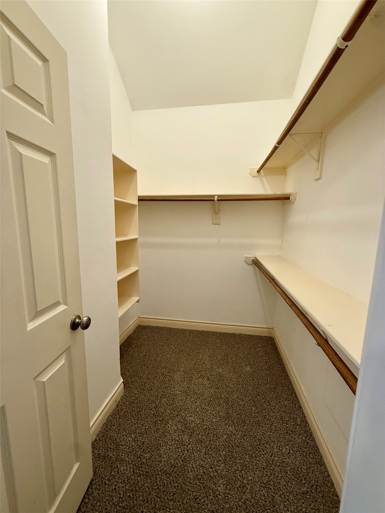 3540 Cline Street Houston, TX 77020 - Photo 16 of 26 Second primary closet showing the high ceilings and wrap-around storage.
