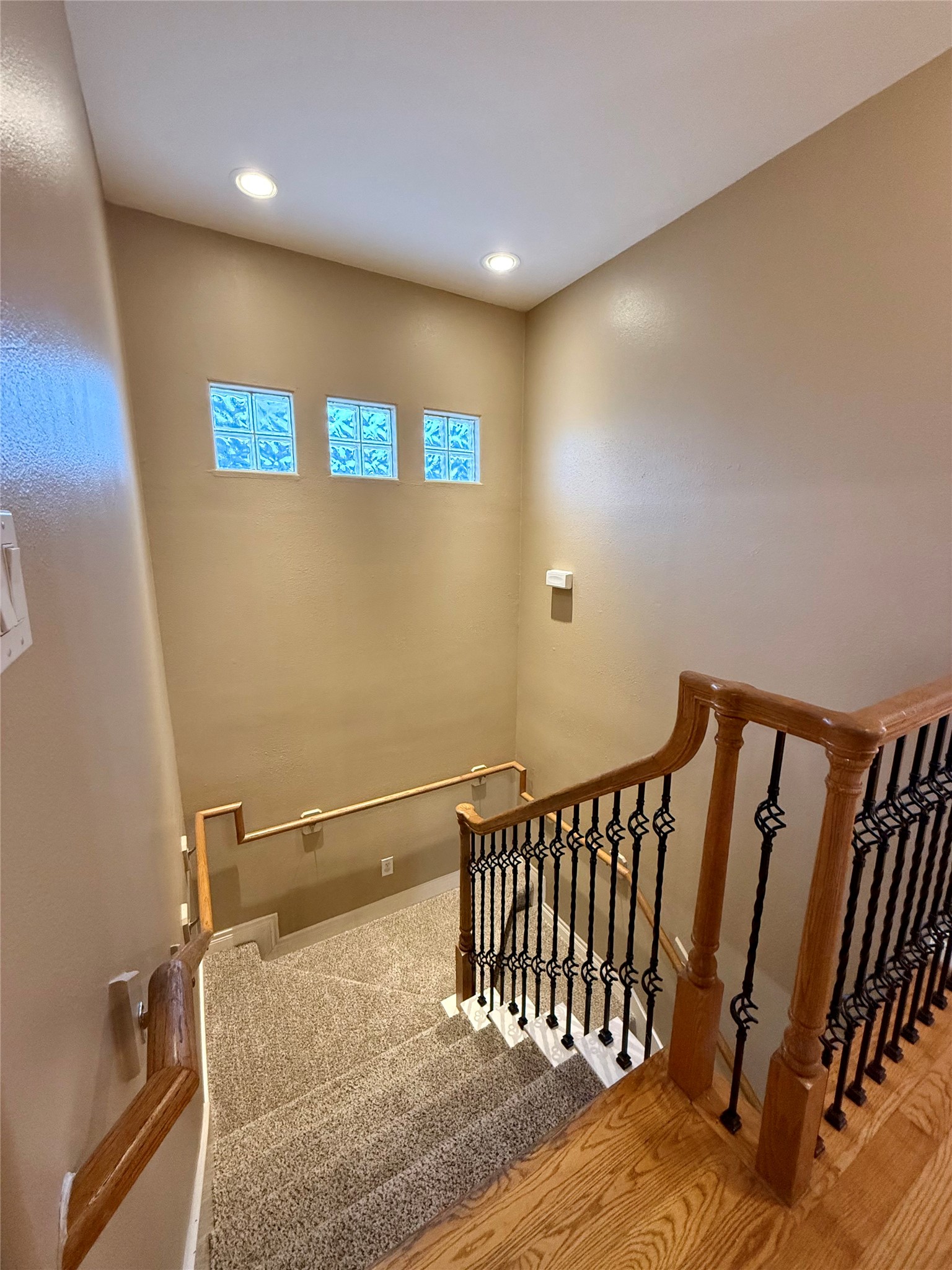 3540 Cline Street Houston, TX 77020 - Photo 24 of 26 View from the stairwell looking down toward the transom windows.