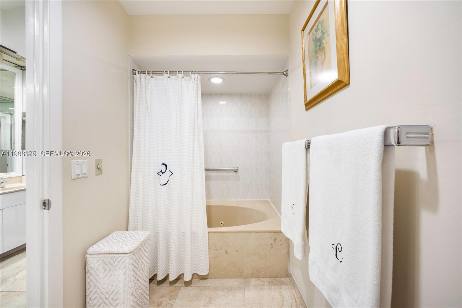 8610 Southwest 83rd Street Miami, FL 33143 - Photo 27 of 45 a bathroom with a shower and a toilet