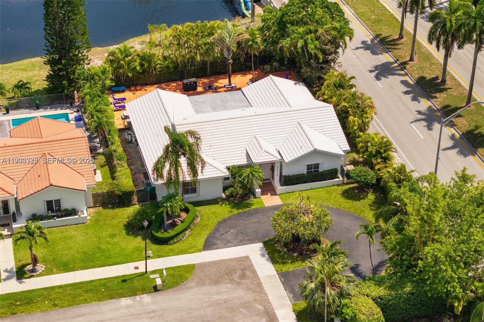 8610 Southwest 83rd Street Miami, FL 33143 - Photo 43 of 45 an aerial view of a house with a swimming pool