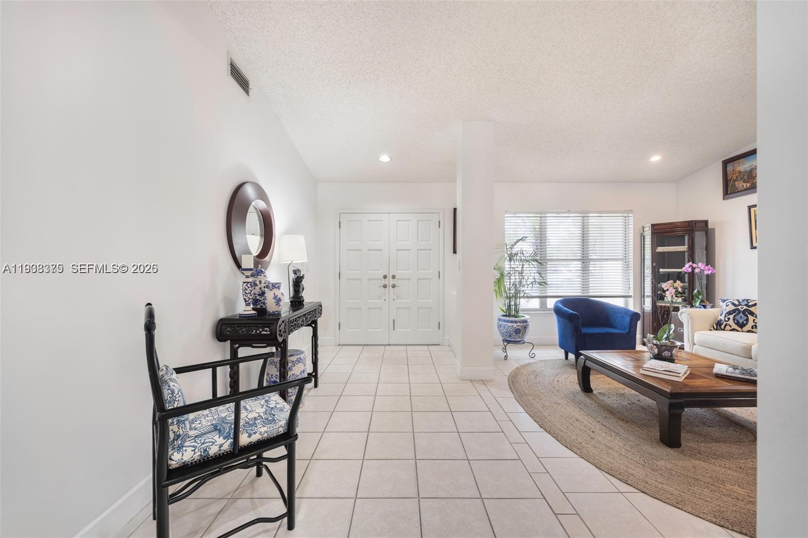 8610 Southwest 83rd Street Miami, FL 33143 - Photo 7 of 45 a living room with furniture