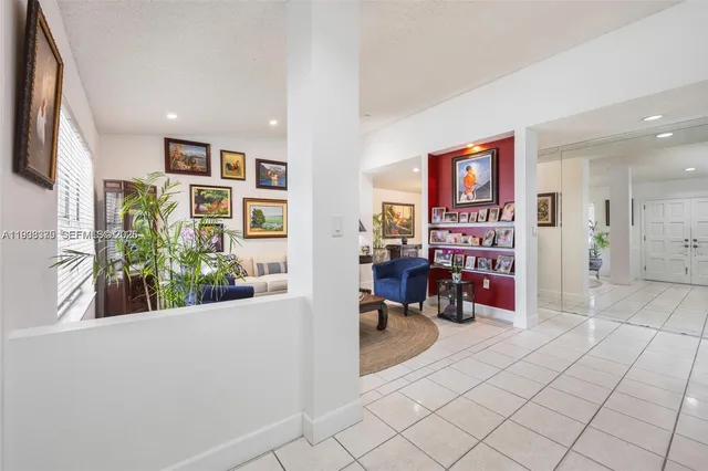 a view of a entryway with workspace and bedroom