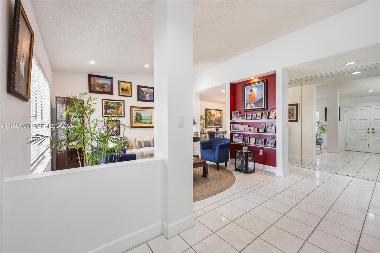 8610 Southwest 83rd Street Miami, FL 33143 - Photo 10 of 45 a view of a entryway with workspace and bedroom