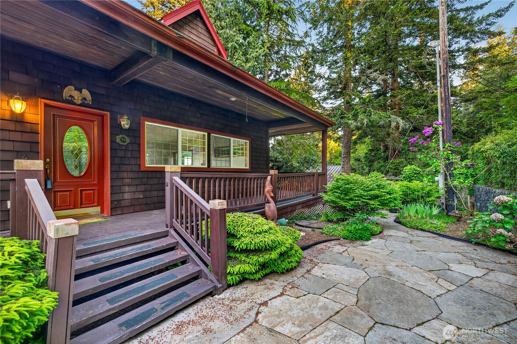 4623 Guemes Island Road Anacortes, WA 98221 - Photo 33 of 40 a front view of a house with garden