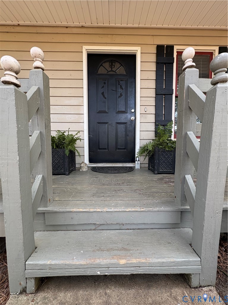 1291 Grapevine Road Sandston, VA 23150 - Photo 3 of 25 The siding and cute porch are wood.