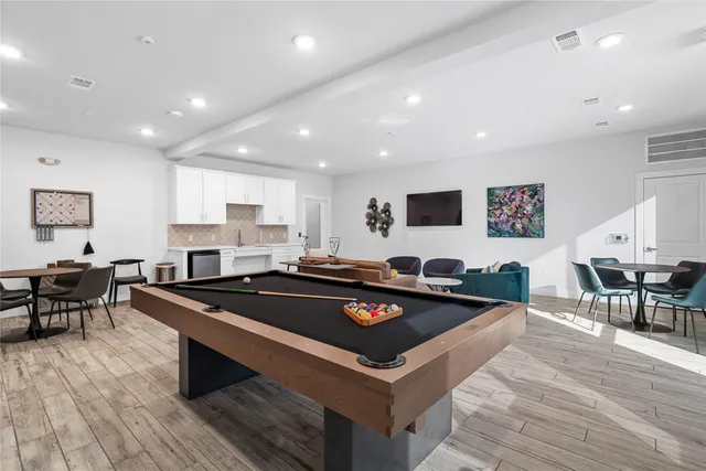a living room with furniture and a closet