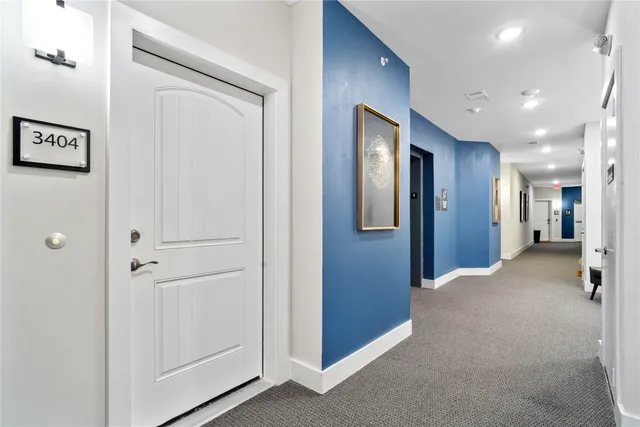 a view of a kitchen counter a sink and wooden floor