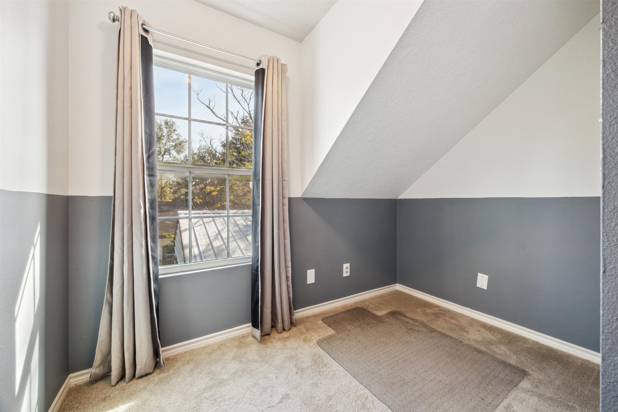3702 Chanterway Street Bacliff, TX 77518 - Photo 12 of 19 a view of an empty room and window