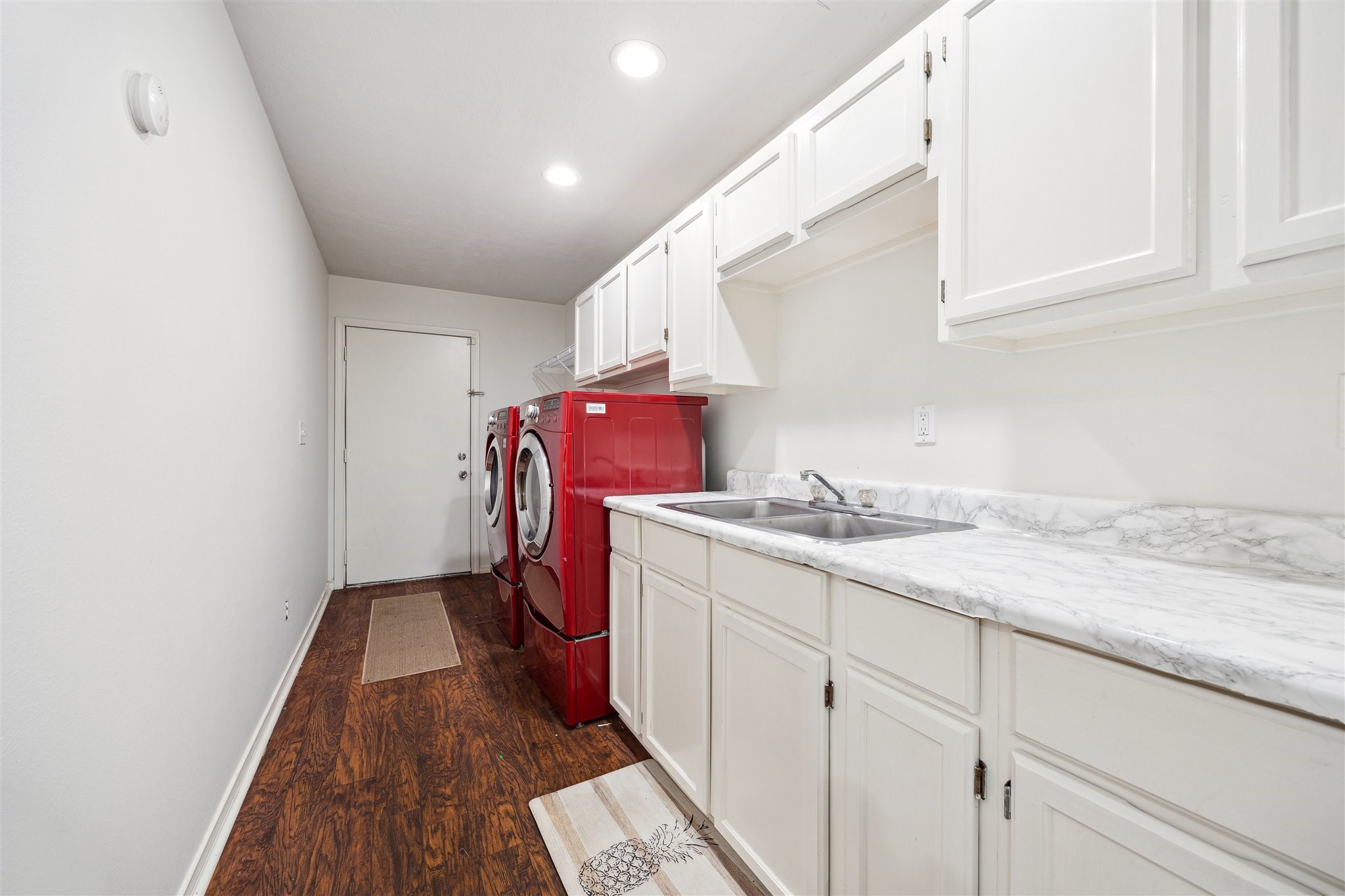 3702 Chanterway Street Bacliff, TX 77518 - Photo 15 of 19 a utility room with sink dryer and washer