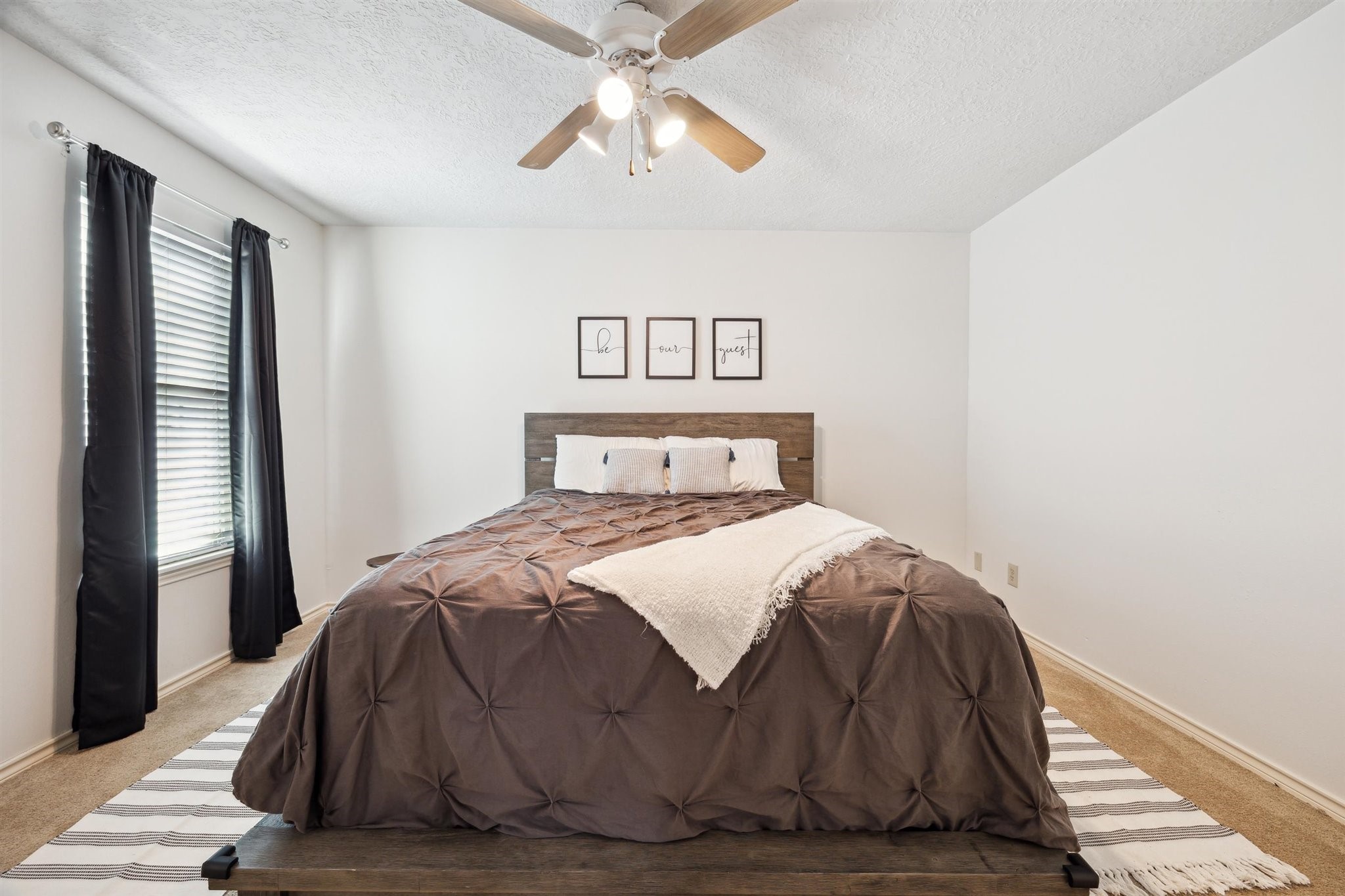 3702 Chanterway Street Bacliff, TX 77518 - Photo 7 of 19 a bedroom with a bed and a window