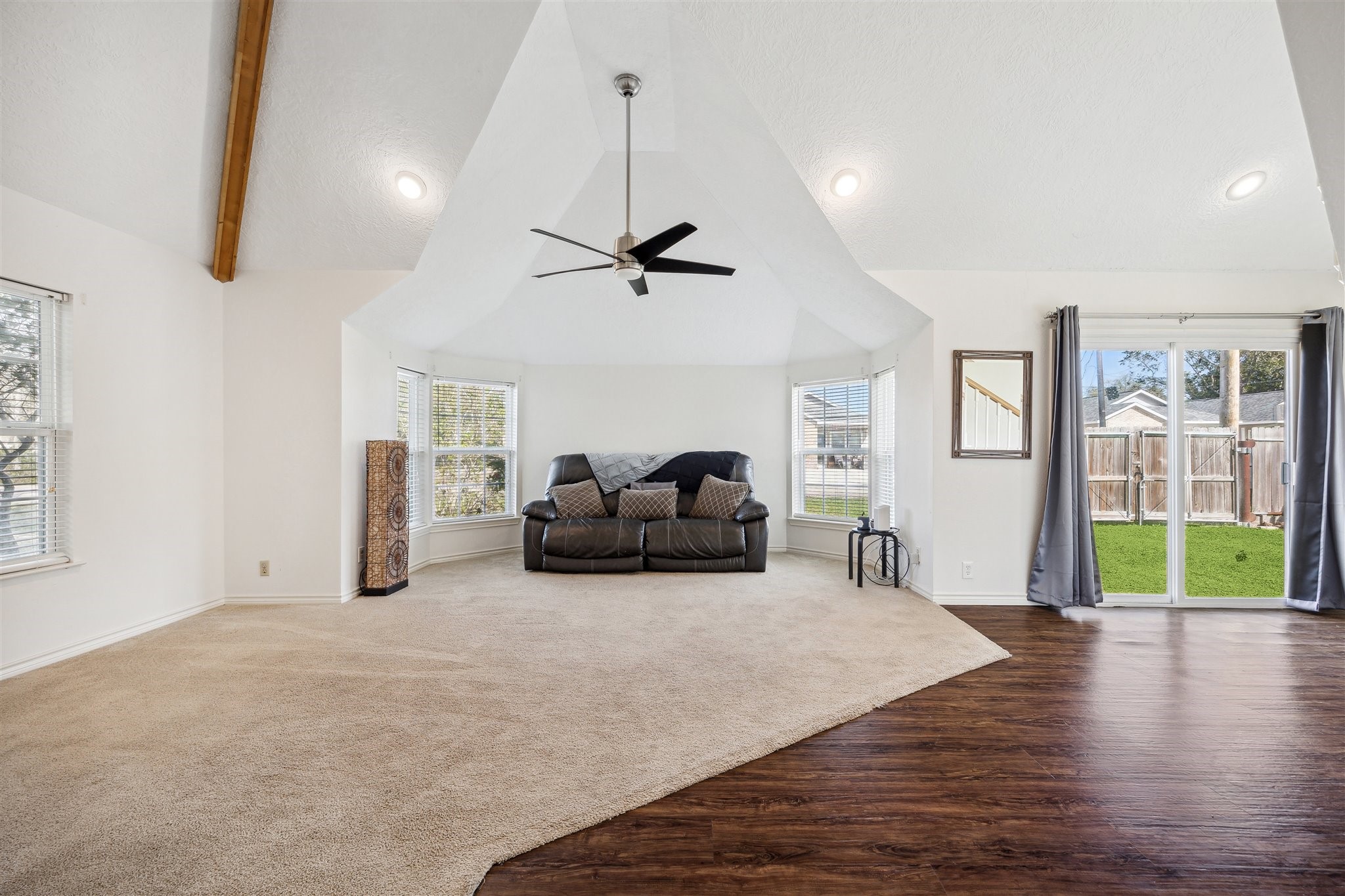 3702 Chanterway Street Bacliff, TX 77518 - Photo 8 of 19 a living room with furniture ceiling fan and a wooden floor