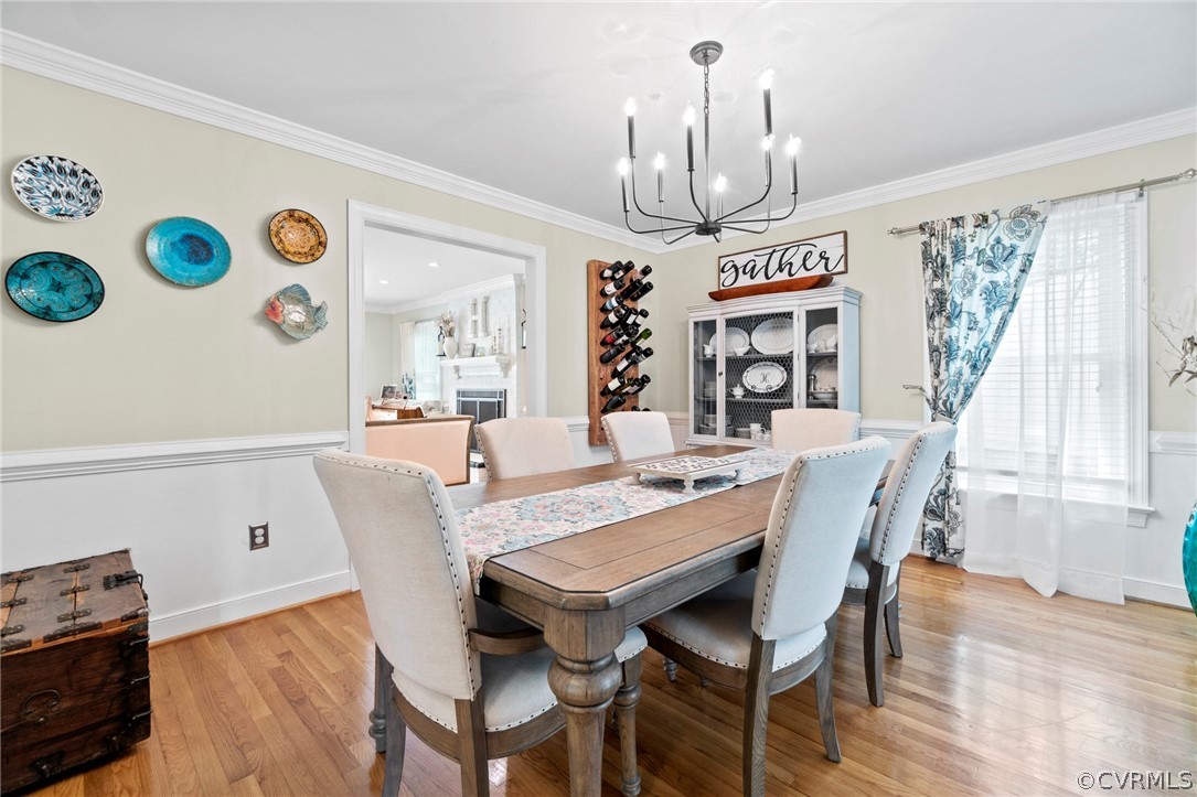 12635 Eagle Ridge Road Henrico, VA 23233 - Photo 6 of 49 Hardwood floors, beautiful chandelier, and crown m
