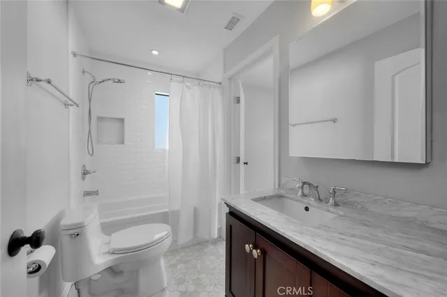 a view of a yard with potted plants