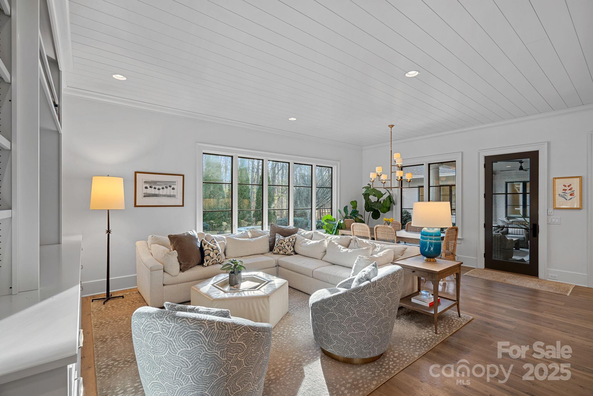 19117 Davidson-Concord Road Davidson, NC 28036 - Photo 14 of 48 a living room with furniture and a large window