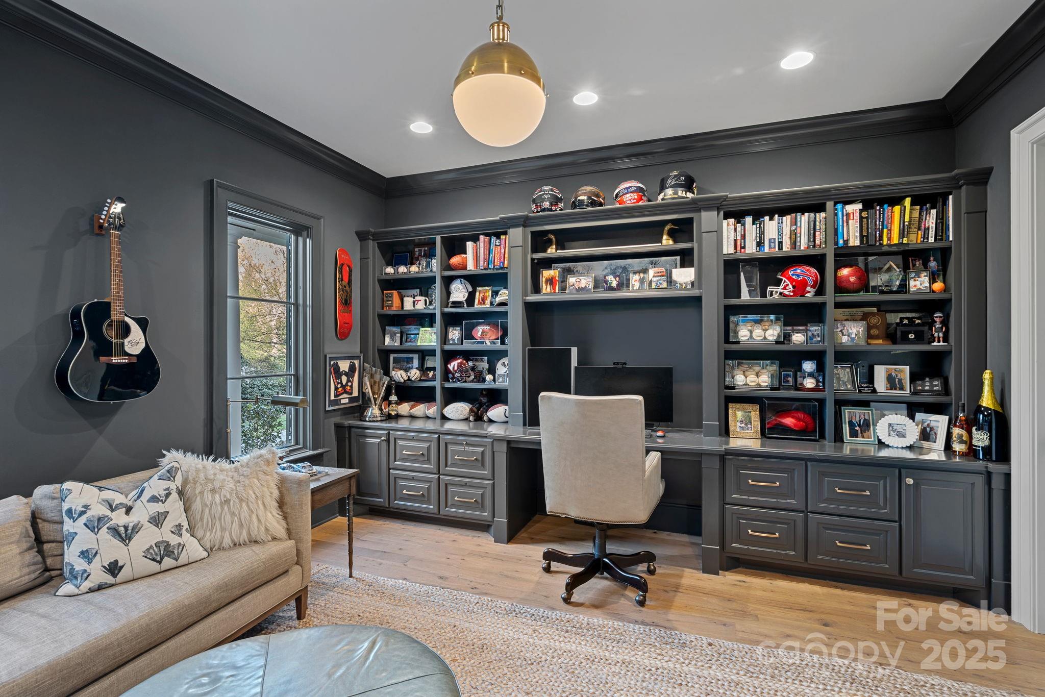 19117 Davidson-Concord Road Davidson, NC 28036 - Photo 24 of 48 a living room with hard wood floors and a couch