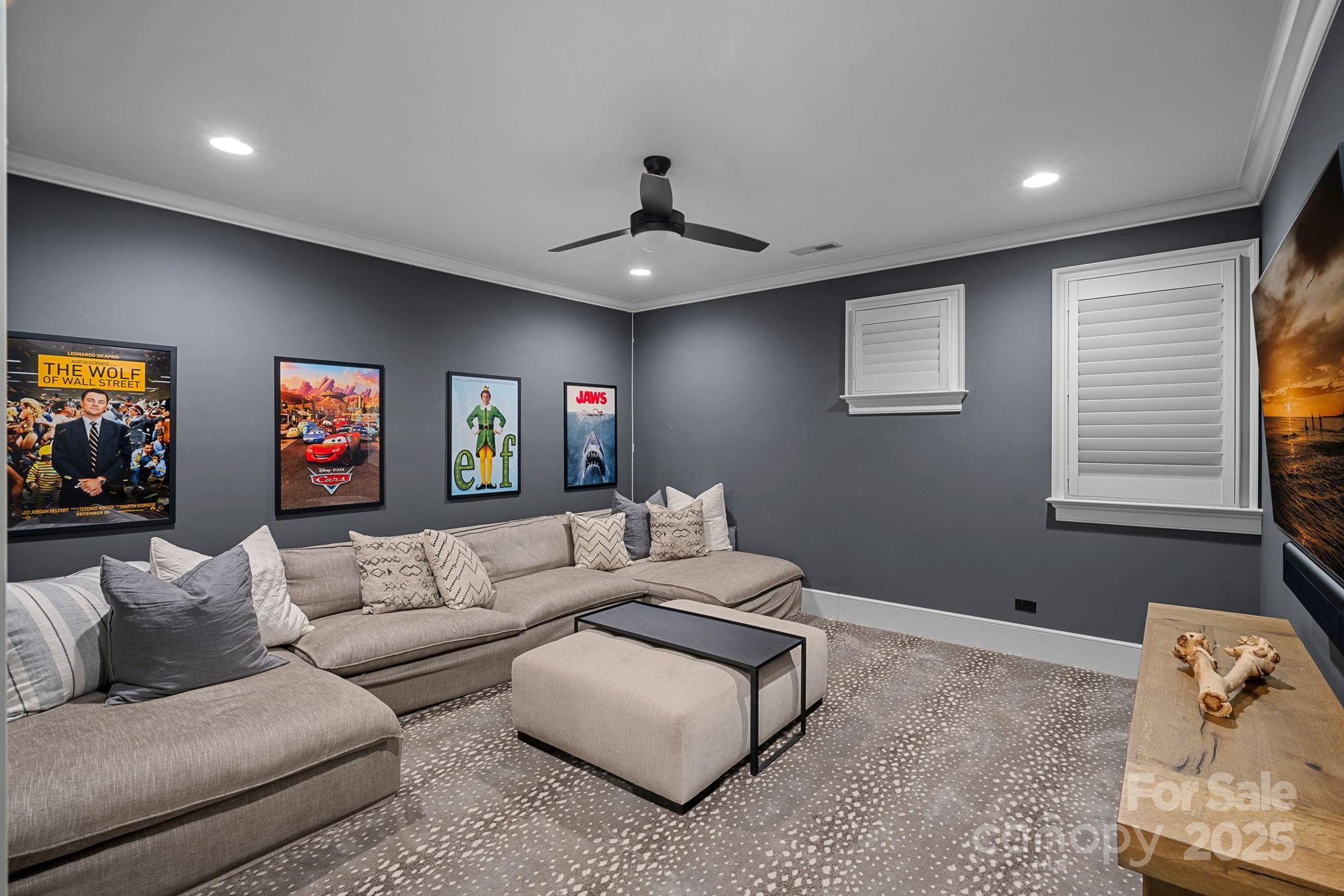 19117 Davidson-Concord Road Davidson, NC 28036 - Photo 31 of 48 a living room with furniture and a ceiling fan