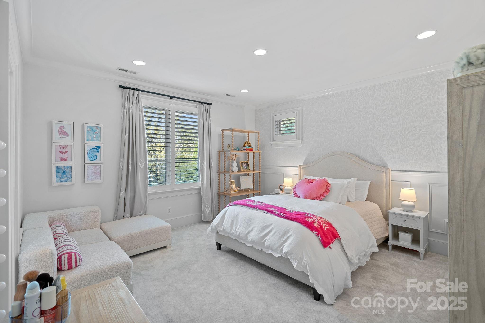 19117 Davidson-Concord Road Davidson, NC 28036 - Photo 32 of 48 a bedroom with a bed and a couch