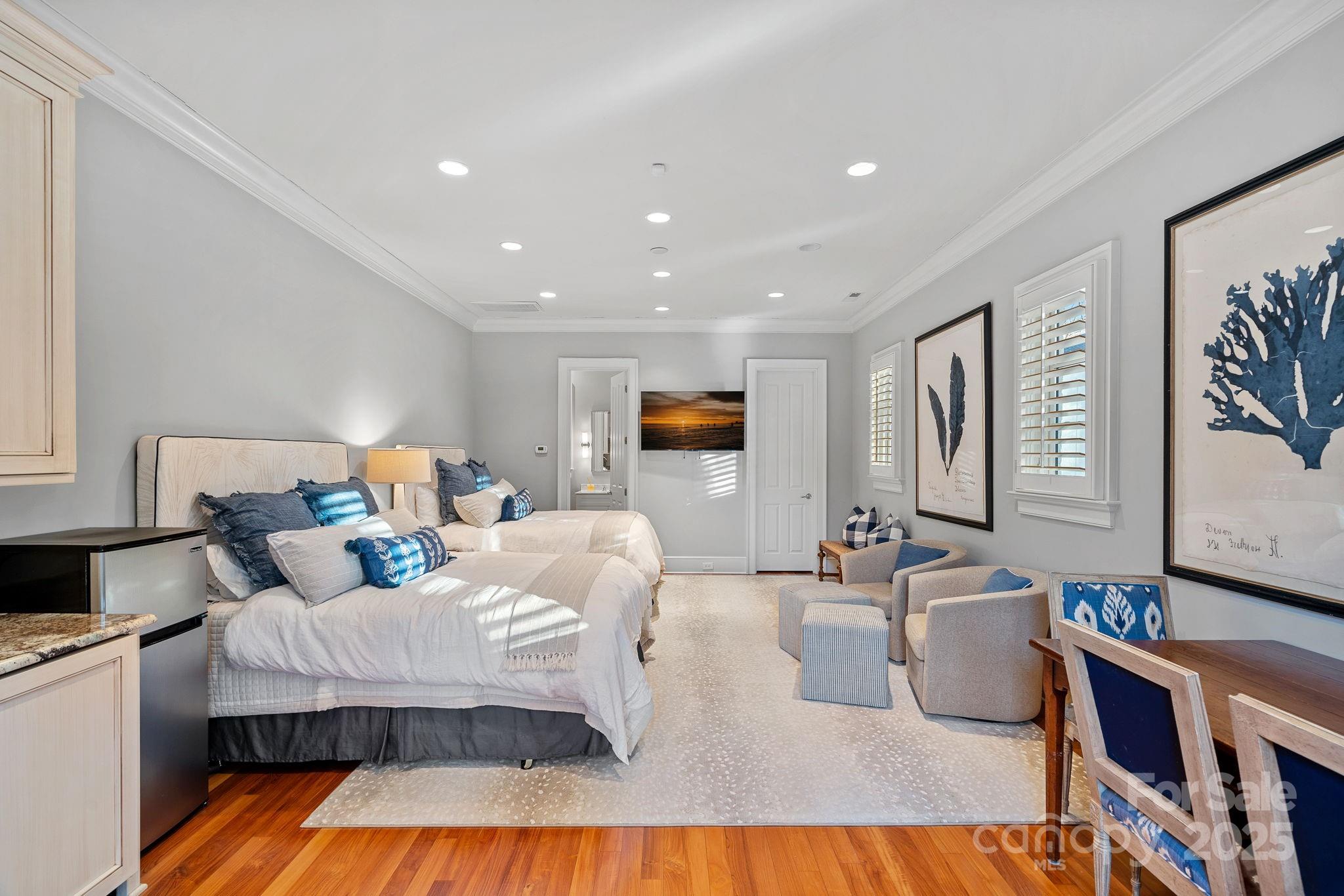 19117 Davidson-Concord Road Davidson, NC 28036 - Photo 34 of 48 a living room with furniture and wooden floor
