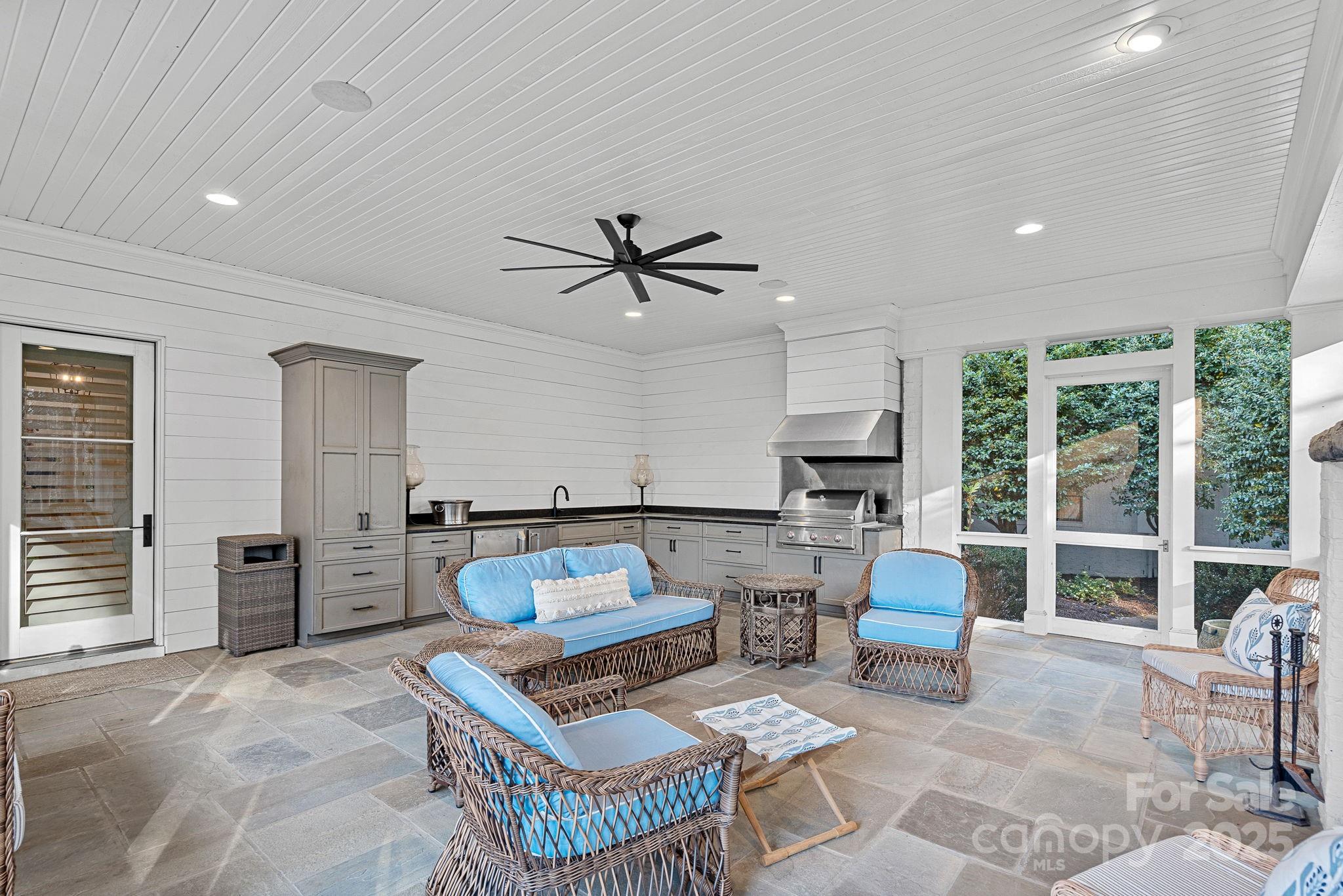19117 Davidson-Concord Road Davidson, NC 28036 - Photo 37 of 48 a living room with furniture and a window