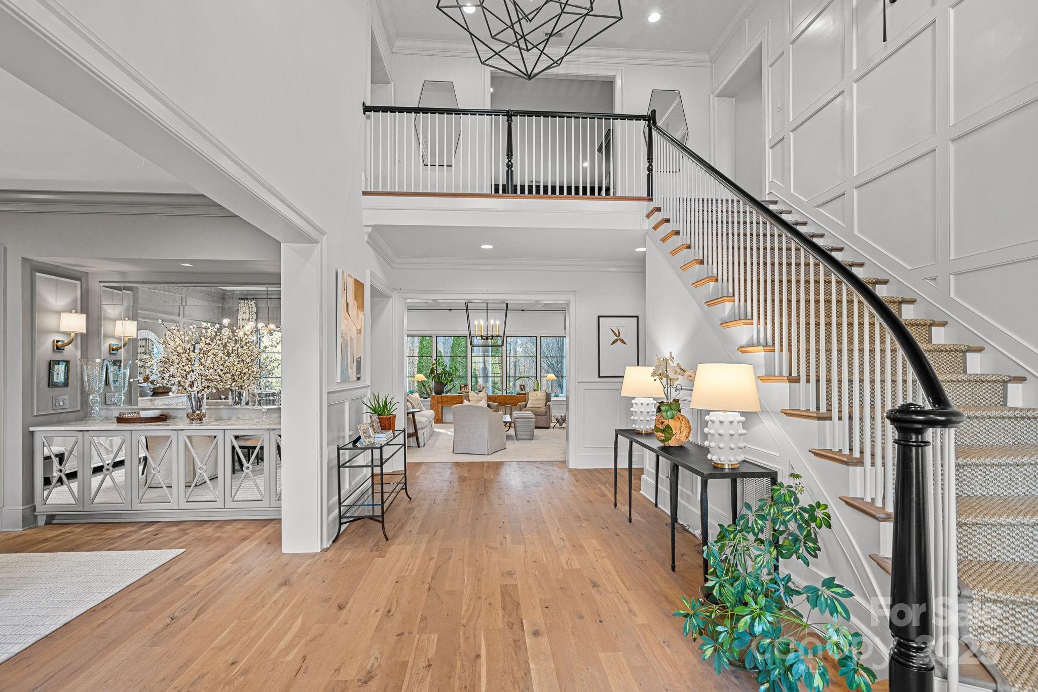 19117 Davidson-Concord Road Davidson, NC 28036 - Photo 4 of 48 a view of hall way with furniture and floor to ceiling window