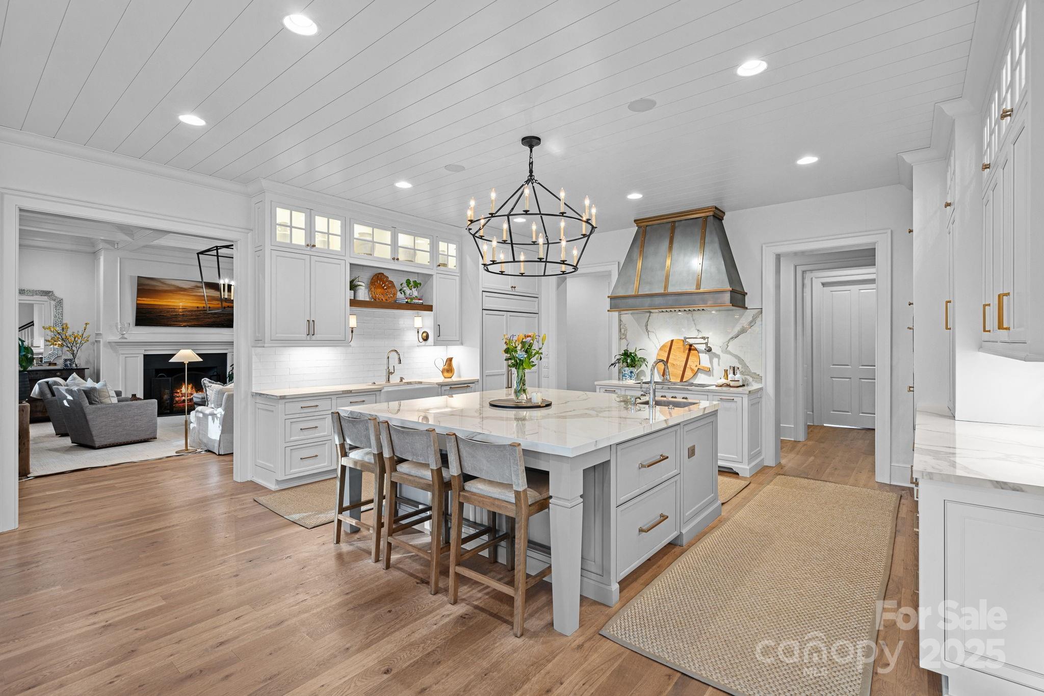 19117 Davidson-Concord Road Davidson, NC 28036 - Photo 10 of 48 a kitchen that has a lot of cabinets in it